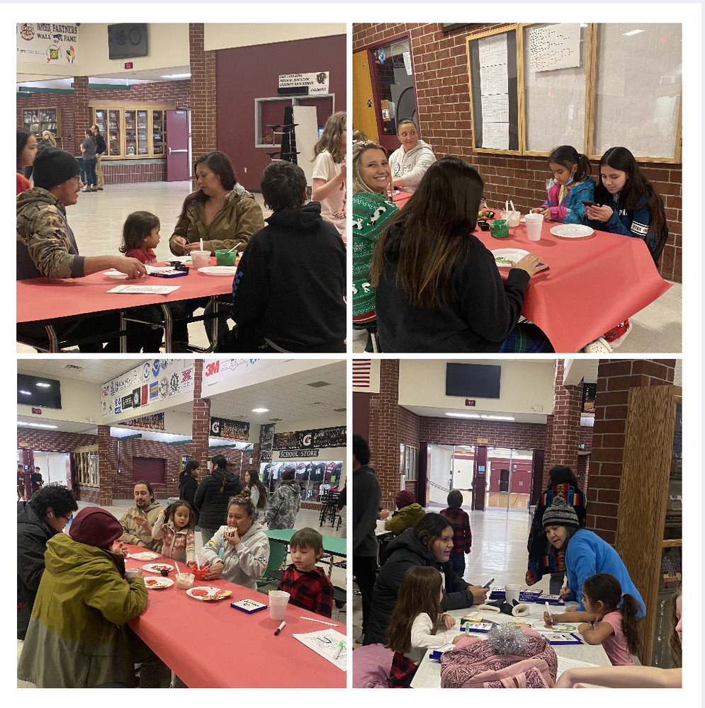 Freshman and their families decorating sugar cookies and enjoying hot cocoa.